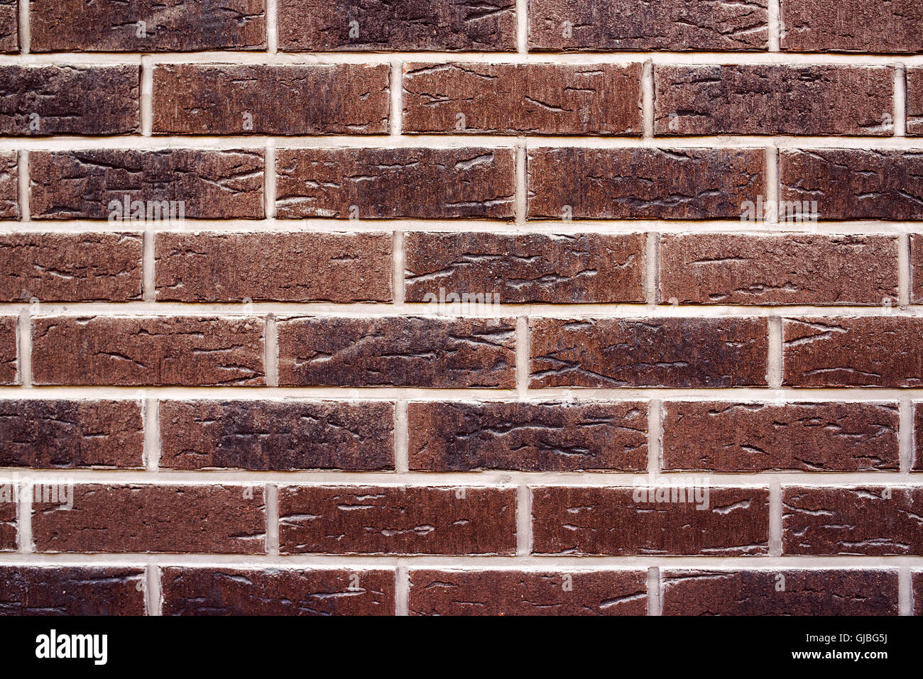 Falsos ladrillos cerámicos de textura de pared exterior Foto de stock