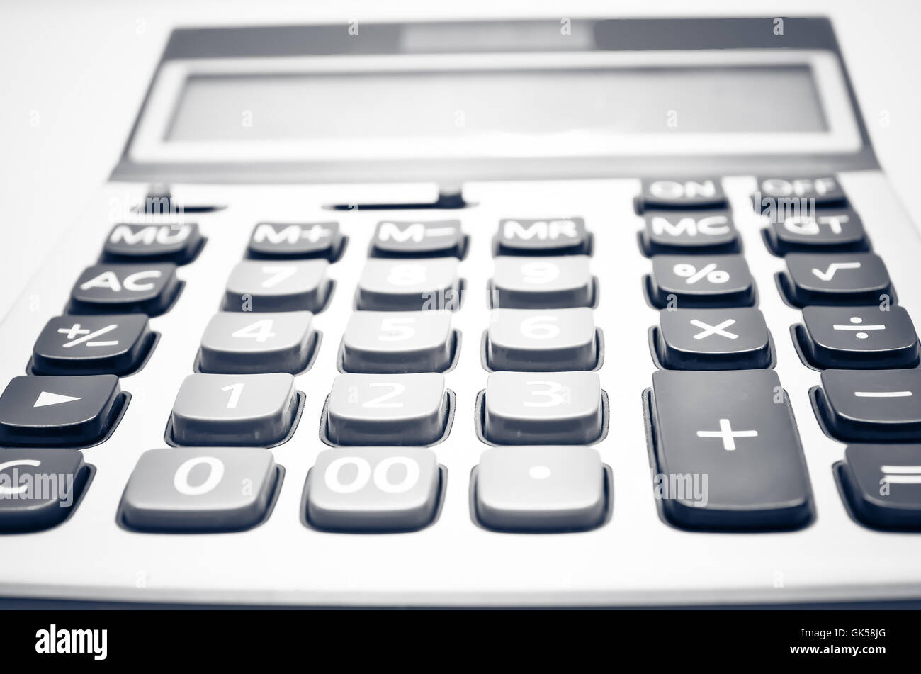 Calculadora en un fondo blanco Fotografía de stock - Alamy