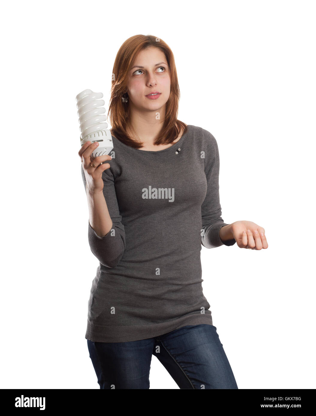 Atractiva Chica sujetando un tubo fluorescente Foto de stock