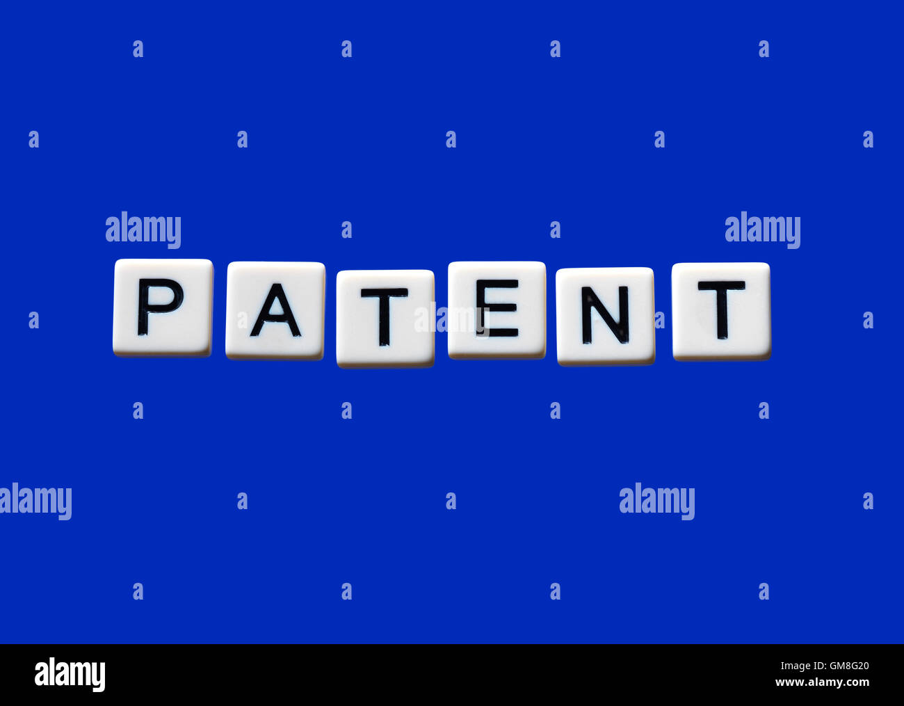 Resaltado de patentes sobre bloques de color blanco Foto de stock