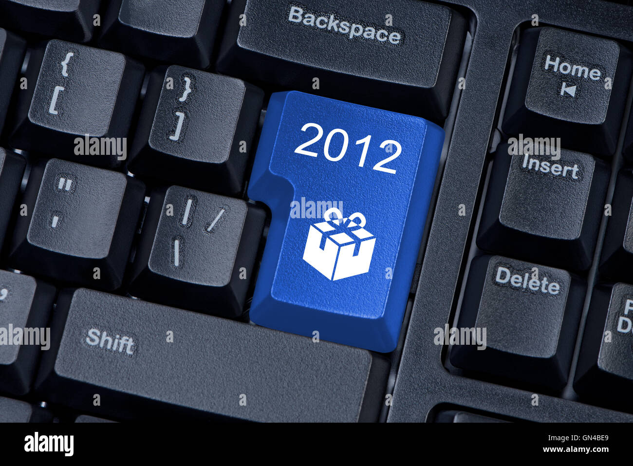 Teclado de ordenador del botón con el icono de regalo y las cifras de 2012  Fotografía de stock - Alamy
