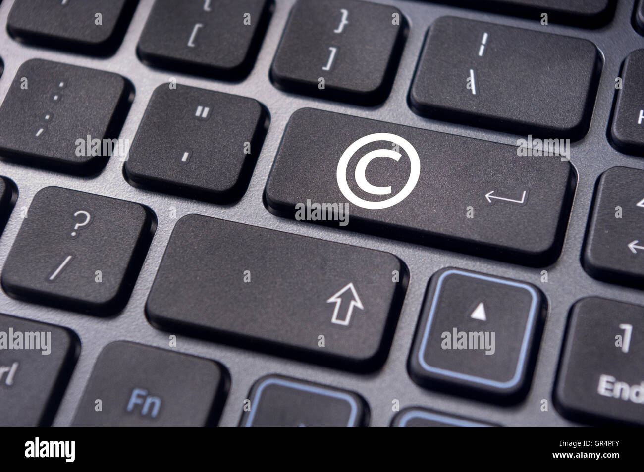 Los conceptos de derechos de autor con el símbolo en el teclado Fotografía  de stock - Alamy