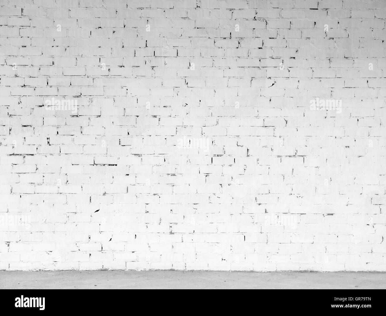 Muro de ladrillo blanco sucio Antecedentes y Escritura sobre Foto de stock