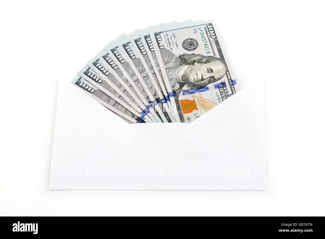 Dólares americanos en un sobre blanco Foto de stock