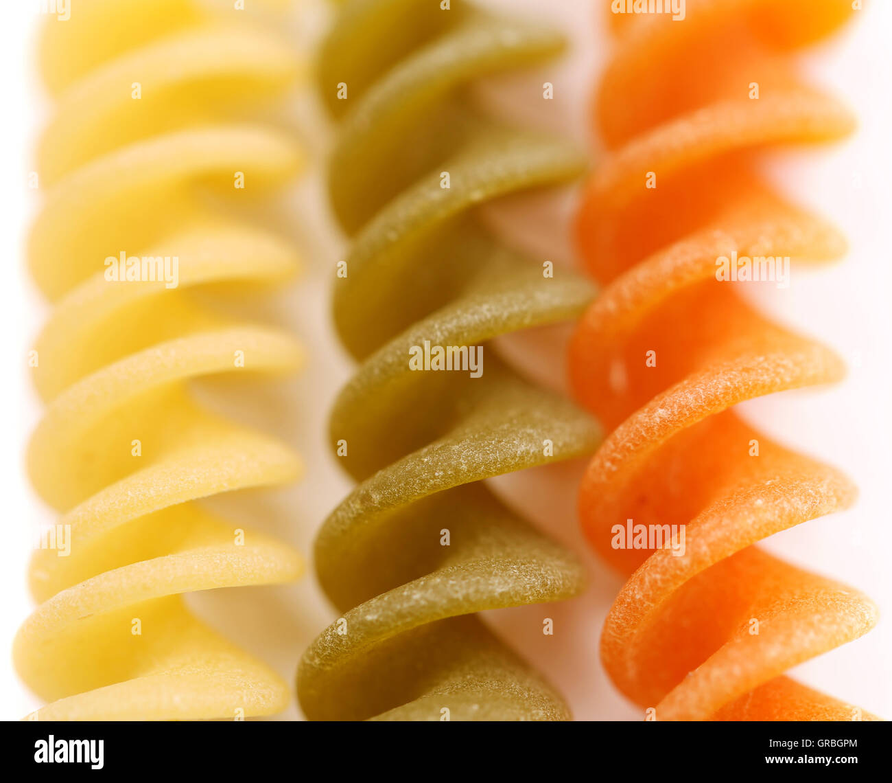 Close-up pasta eliche tricolori. Foto de stock