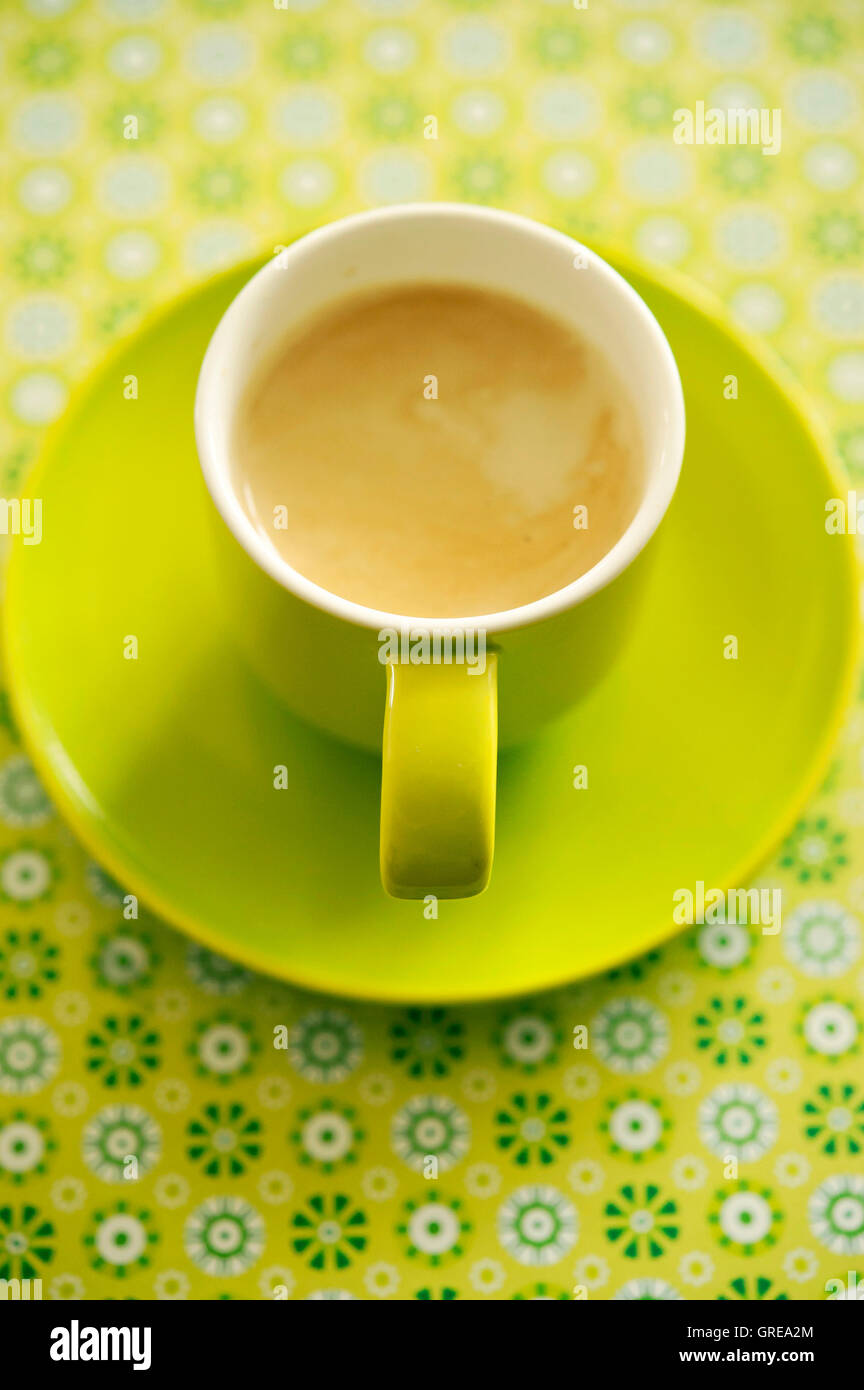 Café espresso en la taza verde Foto de stock