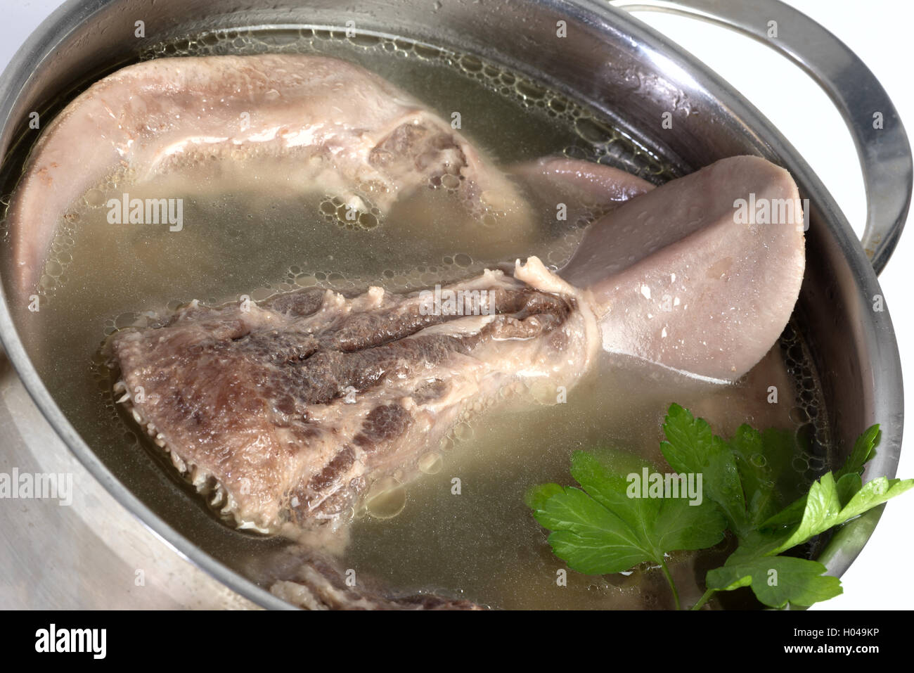 Lengua de cerdo cocido en una sartén Fotografía de stock Alamy