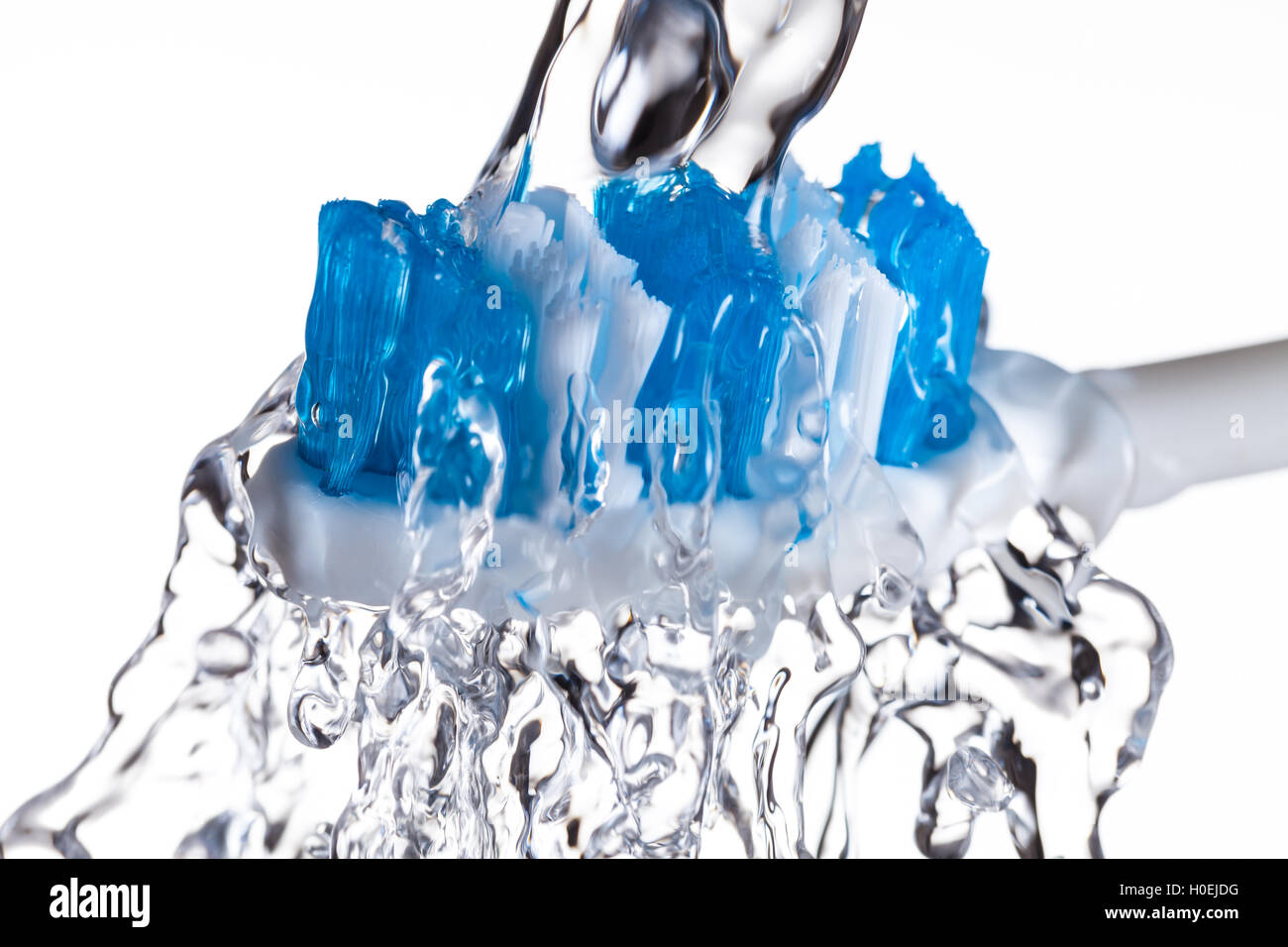 Cepillo de dientes con chorro de agua Foto de stock