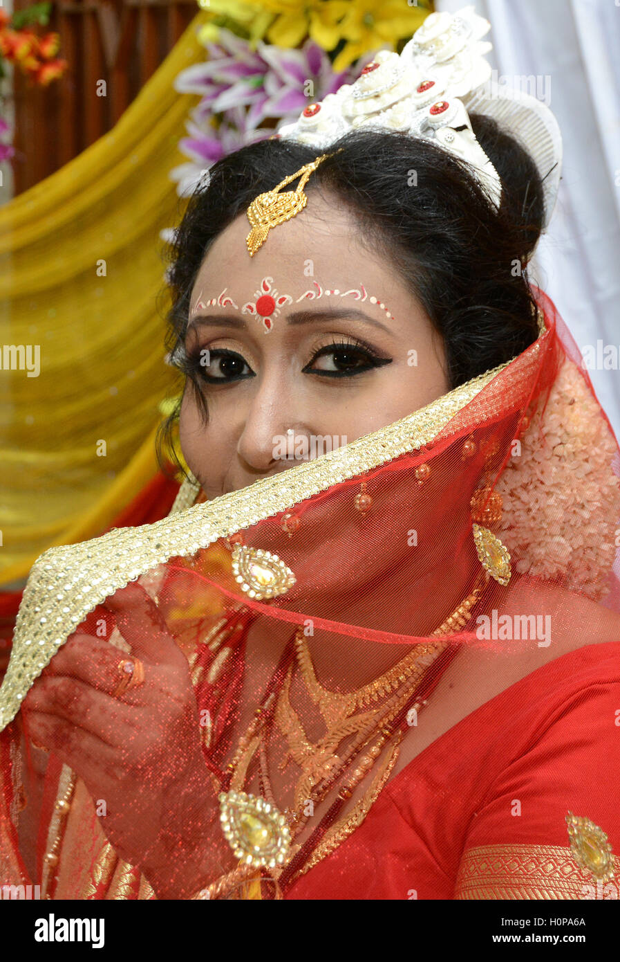 Novia - India una hermosa señora india preparada para el matrimonio de su ceremonia de matrimonio hall. Foto de stock