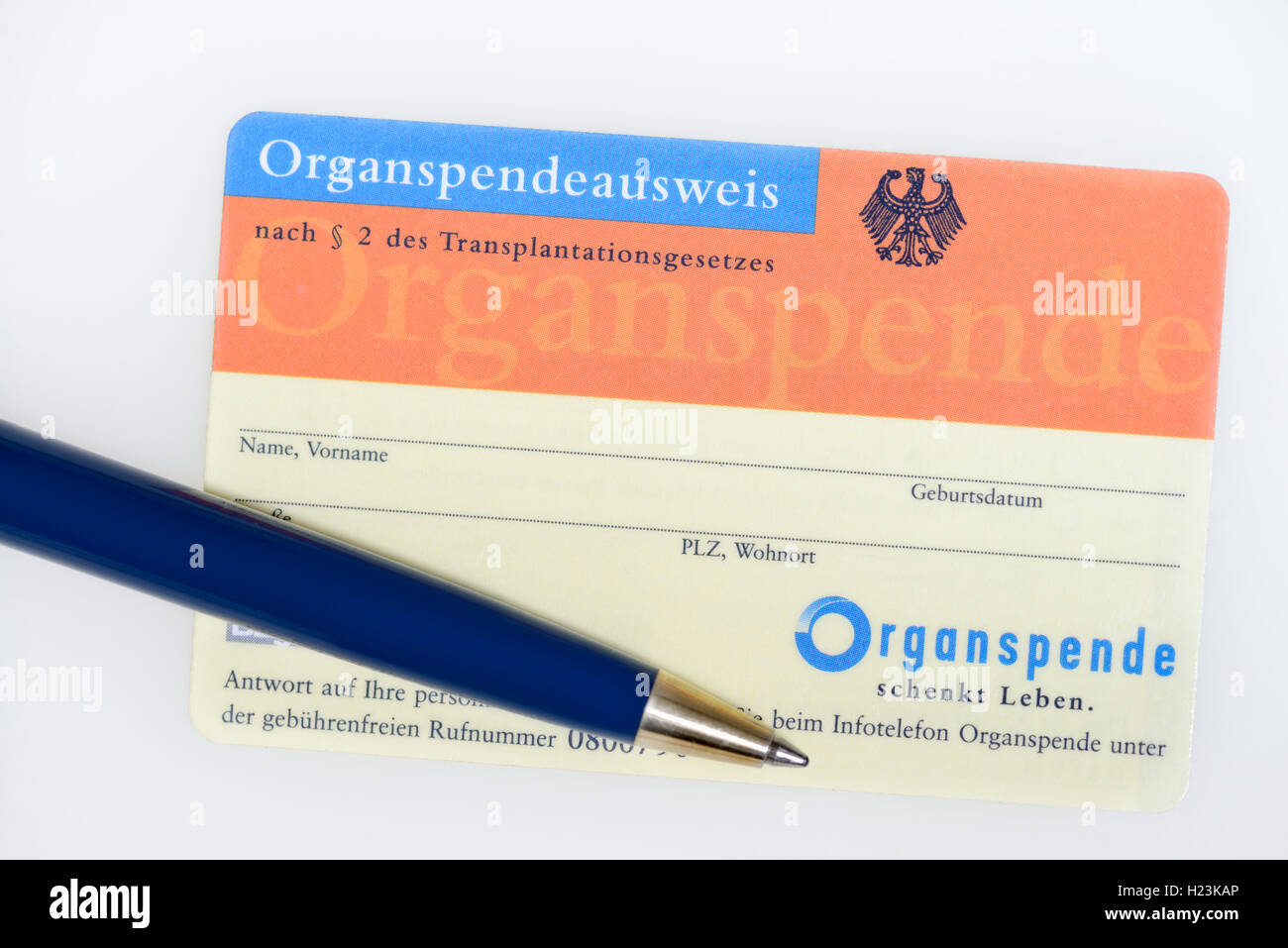 Donar Tarjeta Organspende alemán con bolígrafo Foto de stock