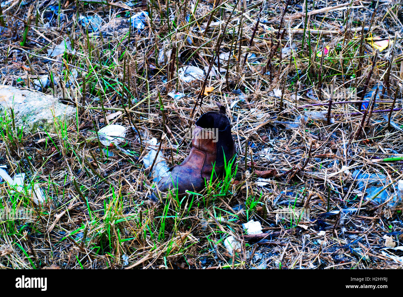 Viejo boot,basura,propinas,desperdicio,zapato Foto de stock