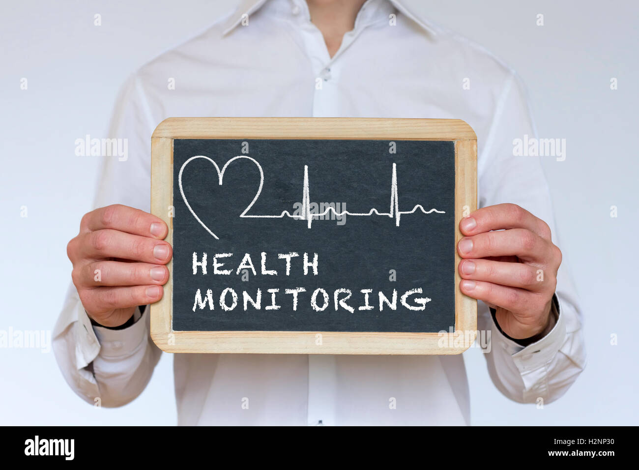 Ilustración de vigilancia de la salud escrito en la pizarra Foto de stock