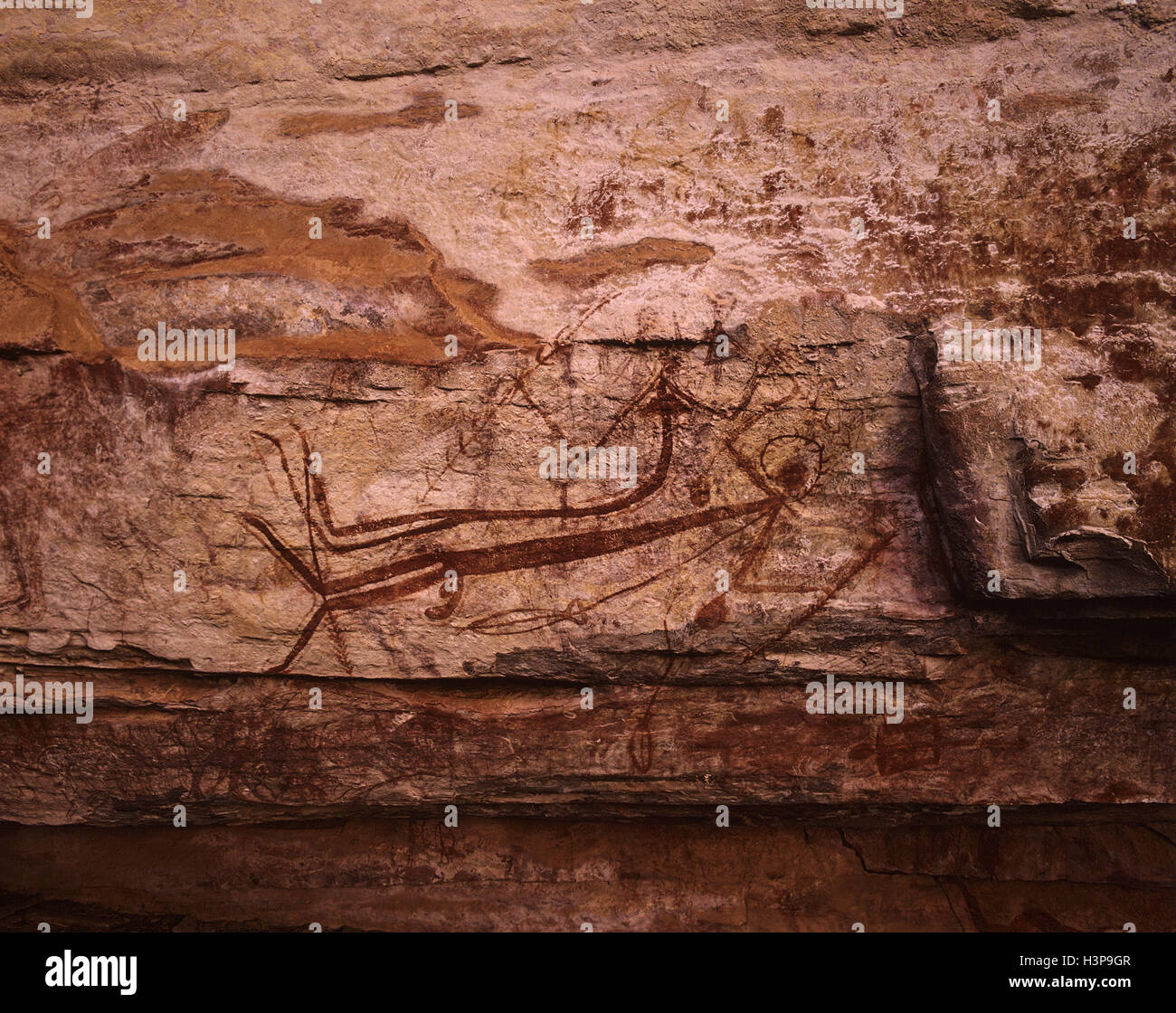 Arte rupestre aborigen: pareja reclinables. Foto de stock