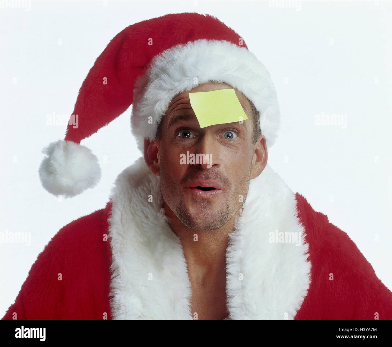 Santa Claus, nota de papel de deslizamiento, en la frente, cara