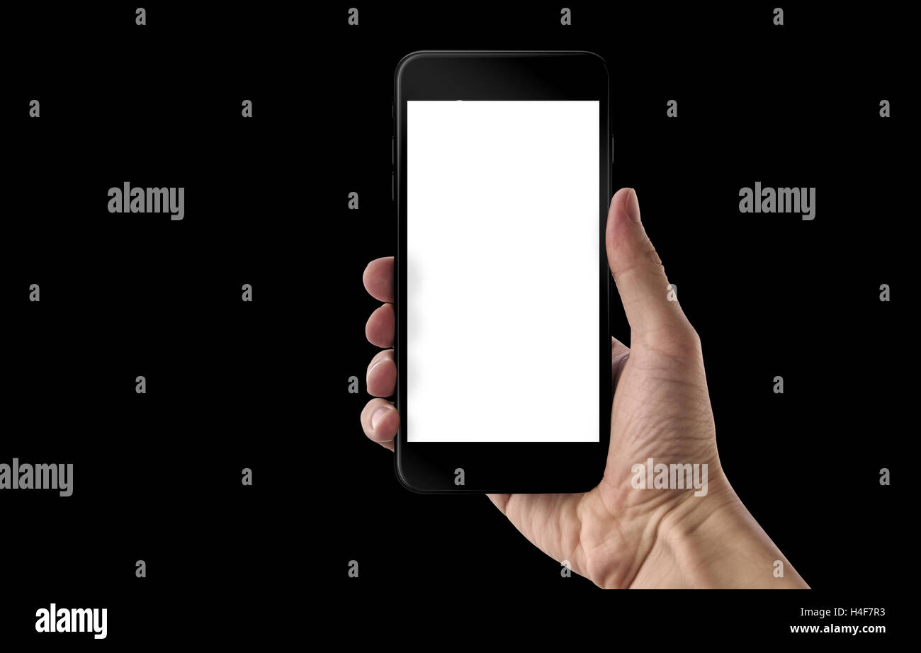 Negro moderno teléfono inteligente en la mano. Pantalla blanca aislada para el boceto. Fondo negro. Foto de stock