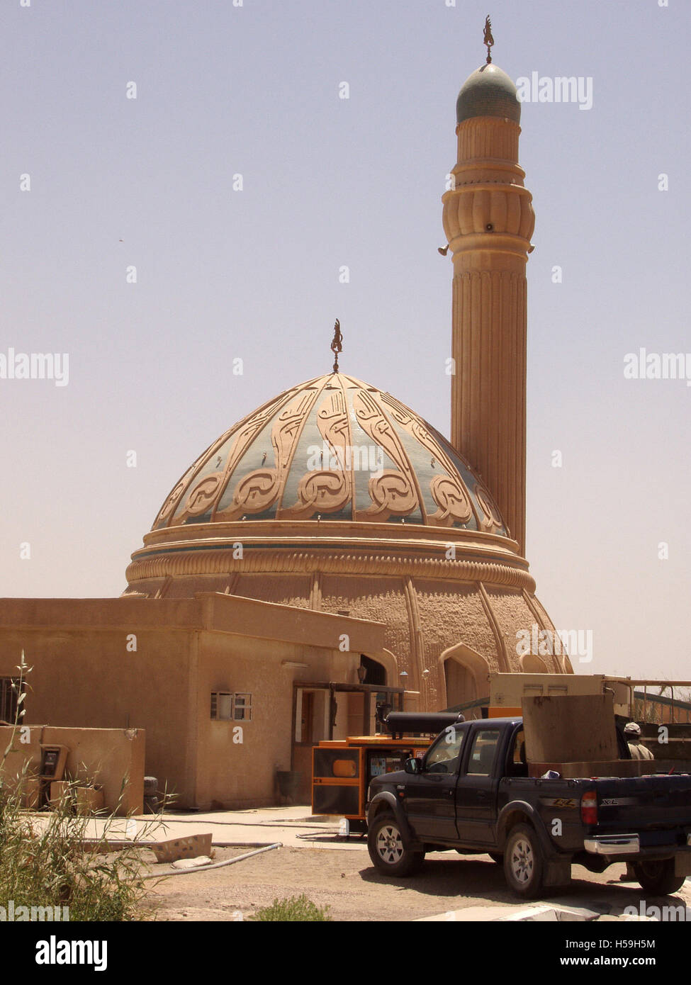 El 25 de julio de 2003 una pequeña mezquita dentro del perímetro del aeropuerto internacional de Bagdad, el antiguo aeropuerto internacional Saddam. Foto de stock