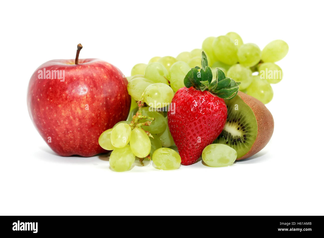 Comer sano. Frescura diversas frutas sobre fondo blanco. Foto de stock