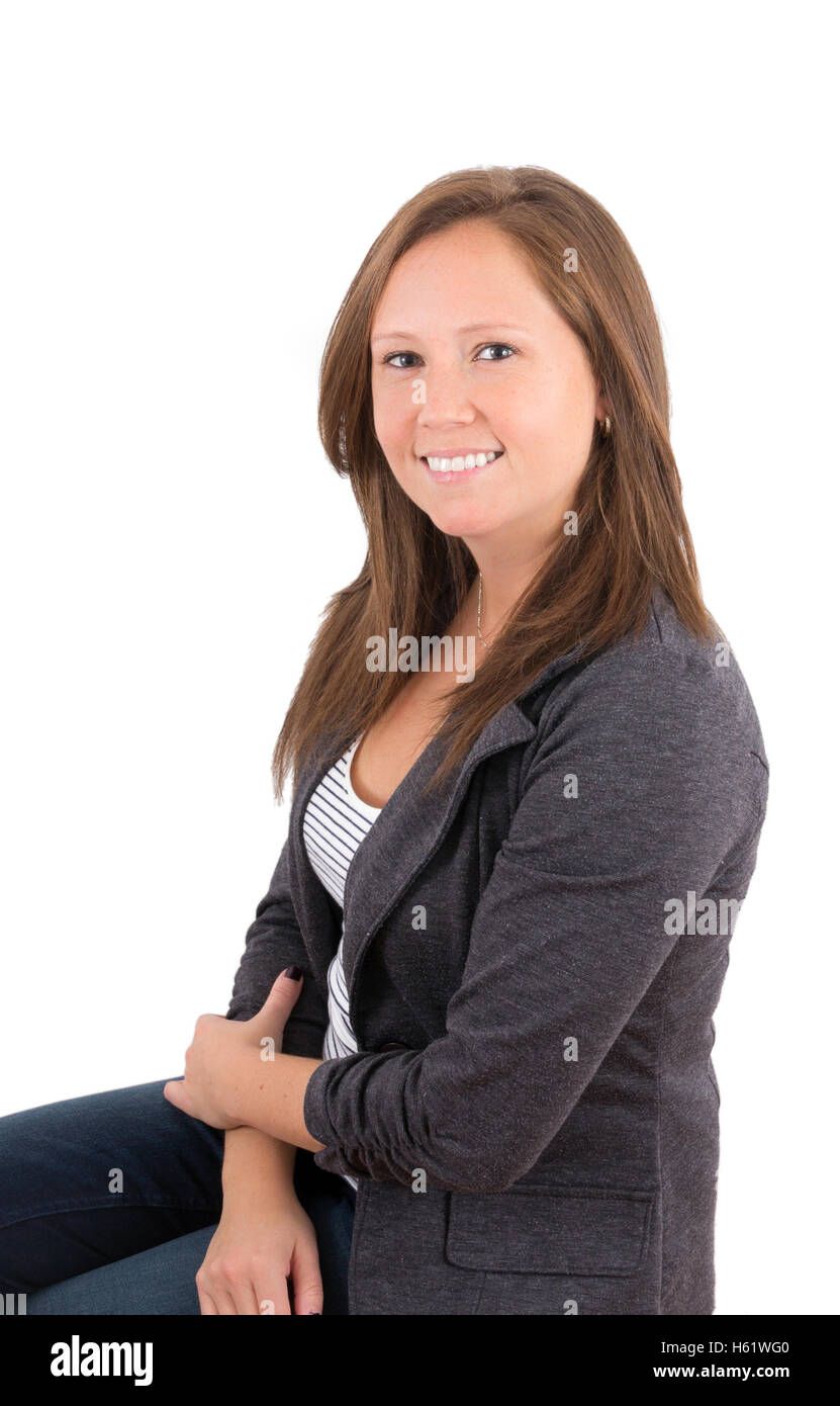 Sonriente mujer de negocios de 30 años de edad sobre fondo blanco. Foto de stock