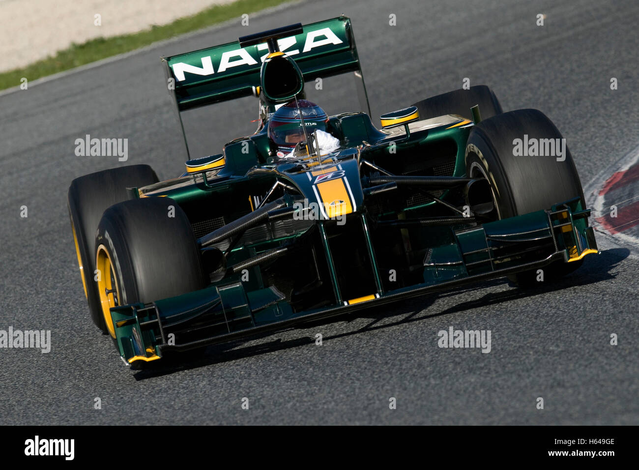 El automovilismo, Jarno Trulli, ITA, en el Lotus T127, el coche de carreras de Fórmula 1 de ensayos en el Circuit de Catalunya, pista de carreras en Foto de stock