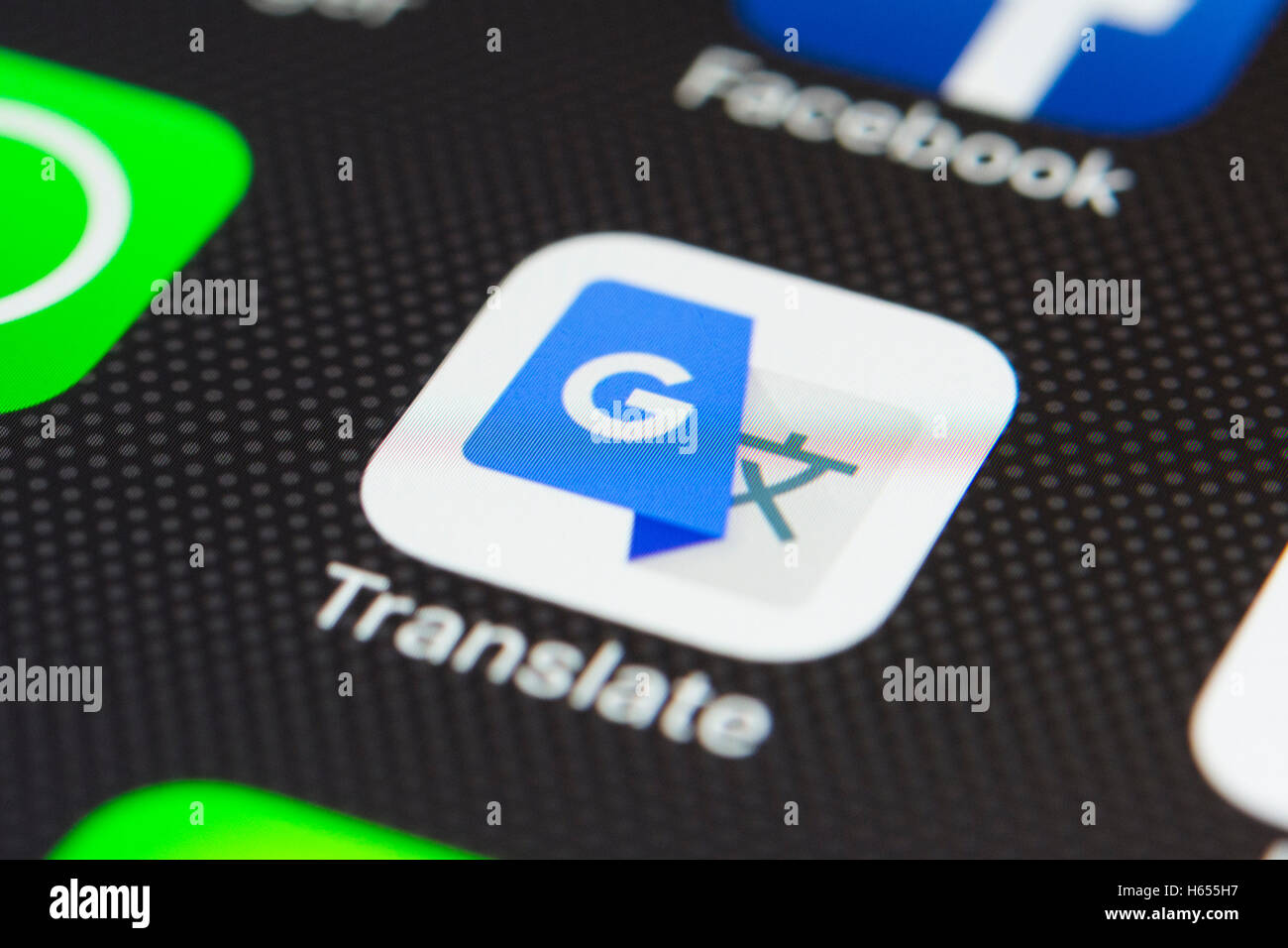 Google Translate app close up en la pantalla del teléfono inteligente iPhone Foto de stock
