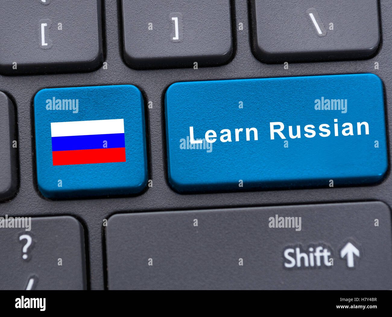 Bandera rusa botón en el teclado y aprender ruso como concepto clave de  aprendizaje virtual Fotografía de stock - Alamy