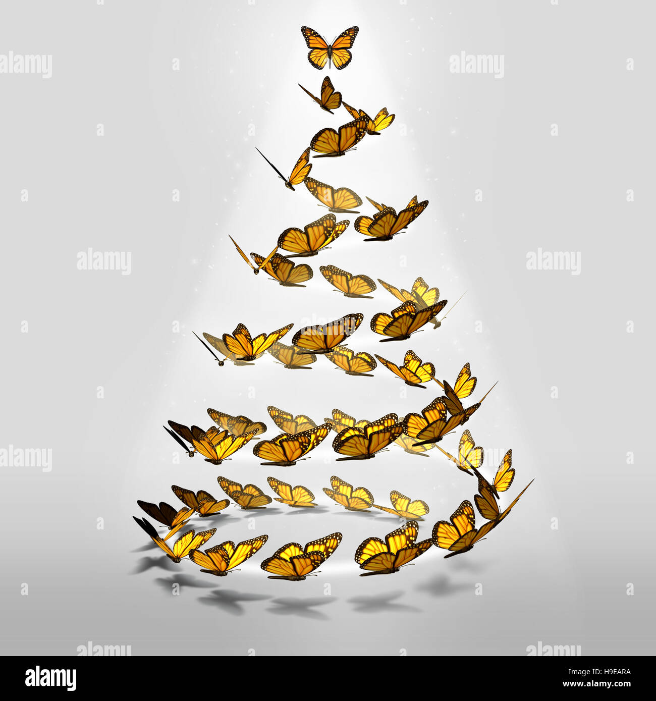 Como un árbol de Navidad de mariposas mágicas vacaciones de invierno en forma de grupo de mariposas como una perenne pino como un símbolo de temporada festiva de la esperanza y de la alegría en Foto de stock