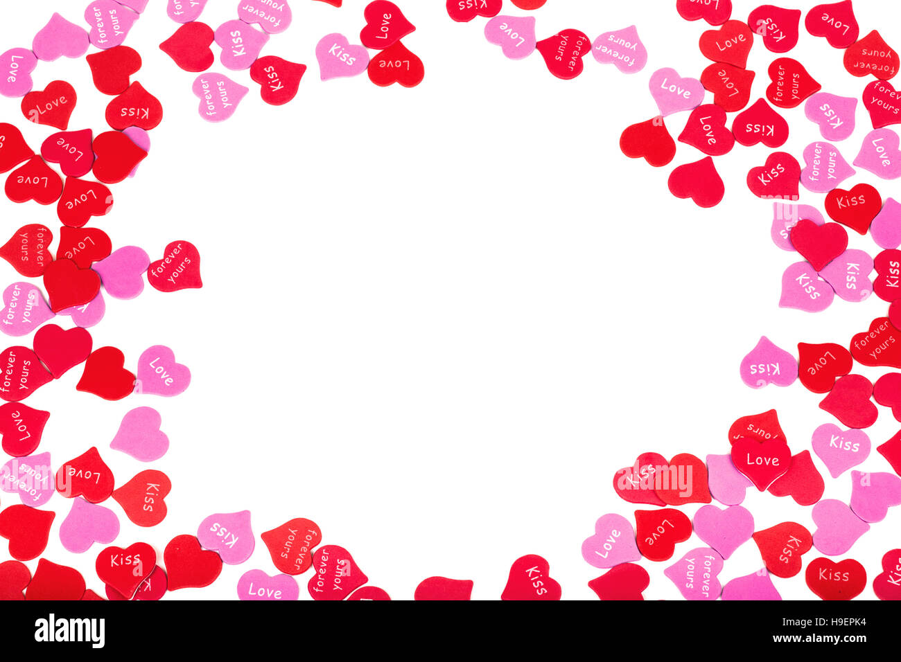 Borde de colorido día de San Valentín corazones de papel Foto de stock