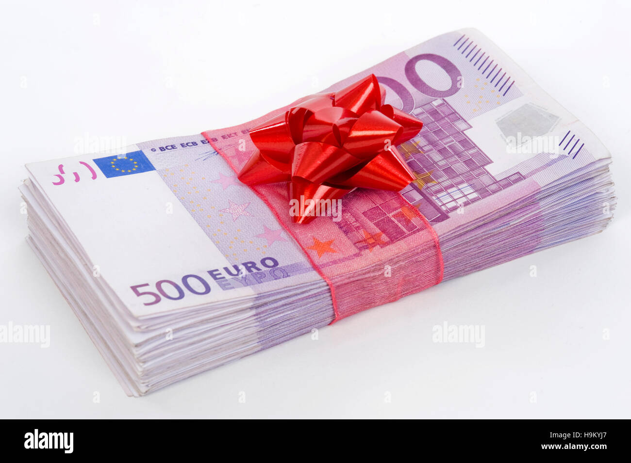 Fajo de billetes de 500 euros con el Lazo Rojo, símbolo de don Dinero  Fotografía de stock - Alamy