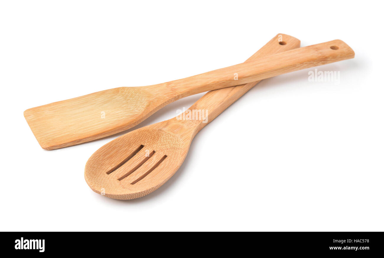 Cocina de cuchara y espátula de madera aislado en blanco Foto de stock