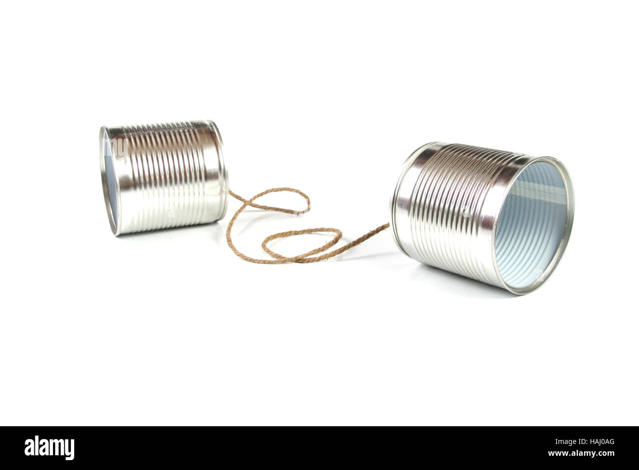El concepto de comunicación: teléfono de latas Foto de stock