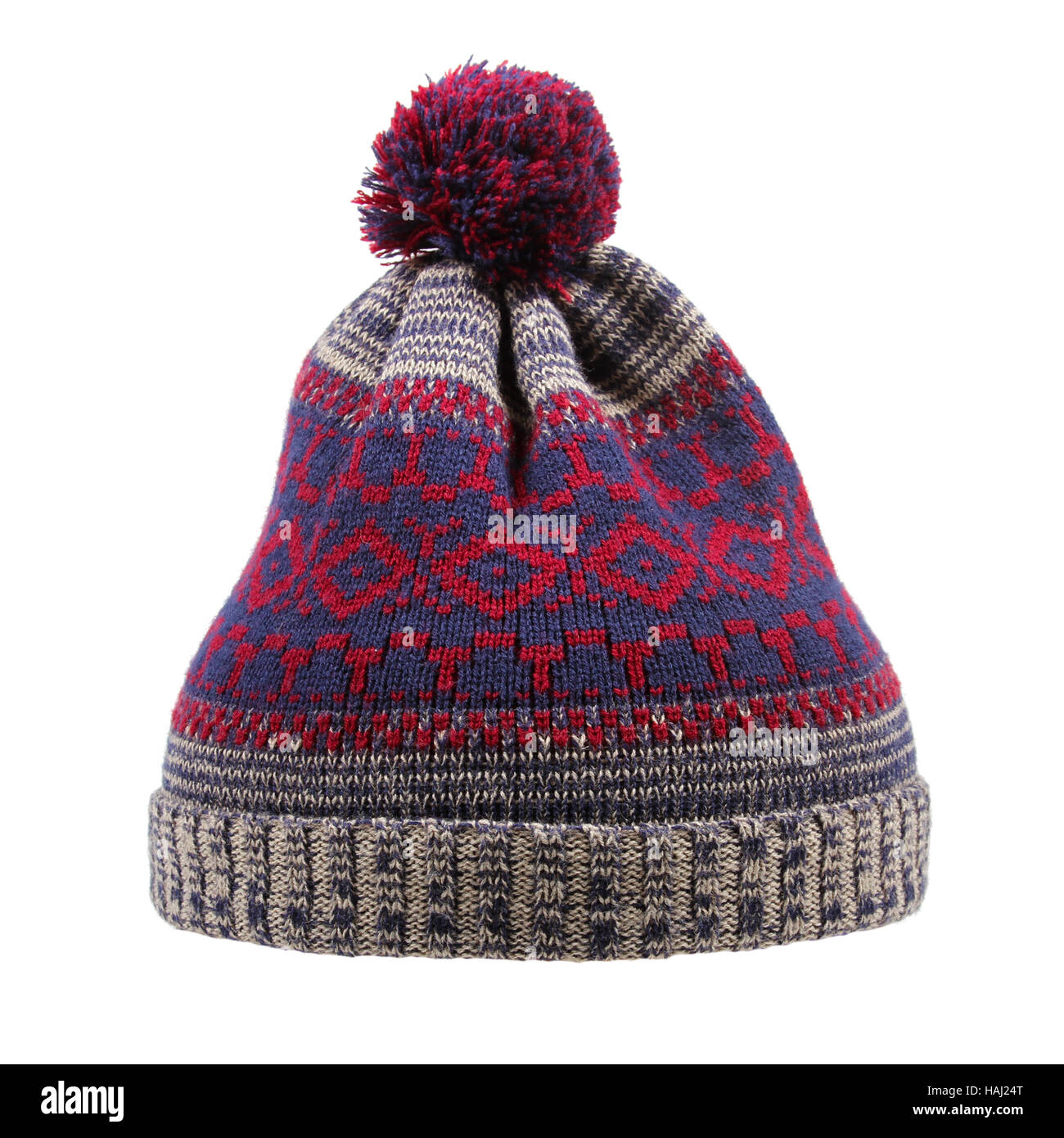 Sombrero de invierno de lana tejida con Pom Pom aislado en blanco Foto de stock