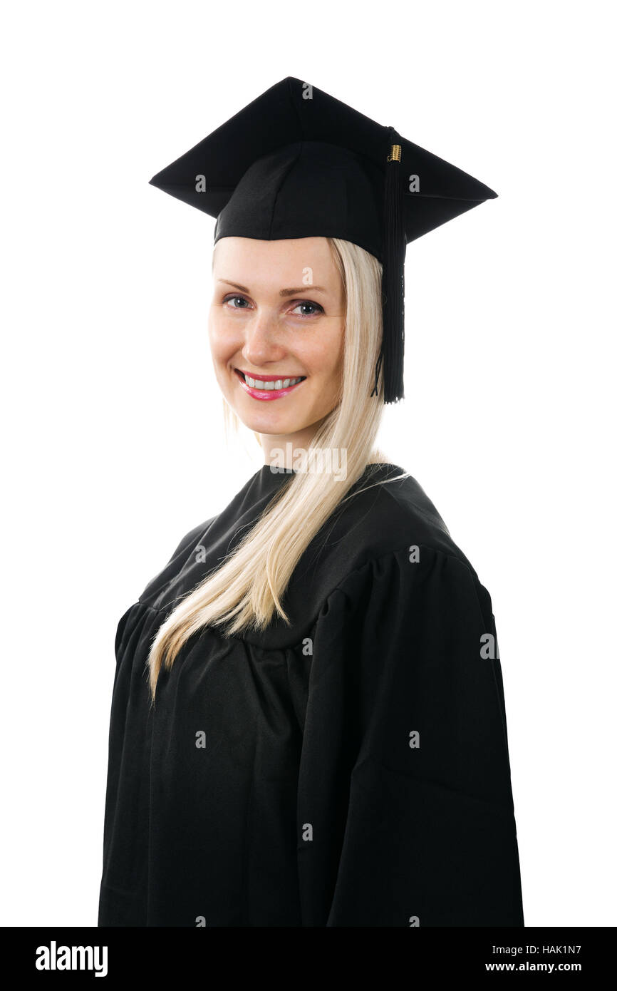 Feliz sonriendo college graduate vistiendo una bata sobre blanco Foto de stock