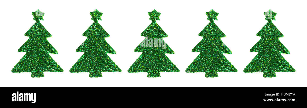 Una fila de glitter verde árbol de Navidad pegatinas aislado sobre un fondo  blanco Fotografía de stock - Alamy