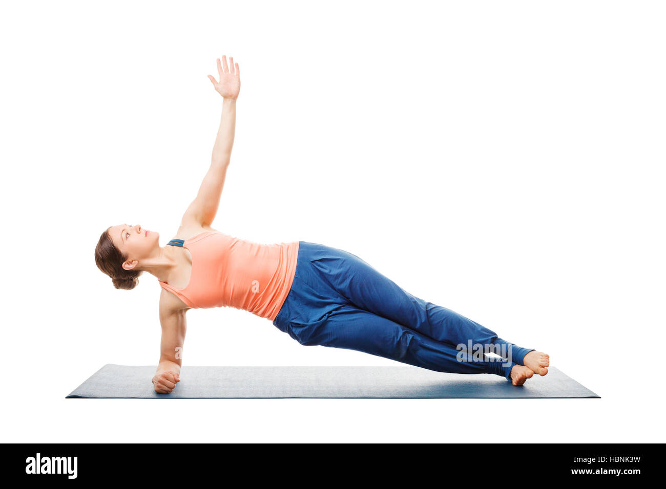 Mujer haciendo yoga asana Vasisthasana - plancha lateral plantean Foto de stock