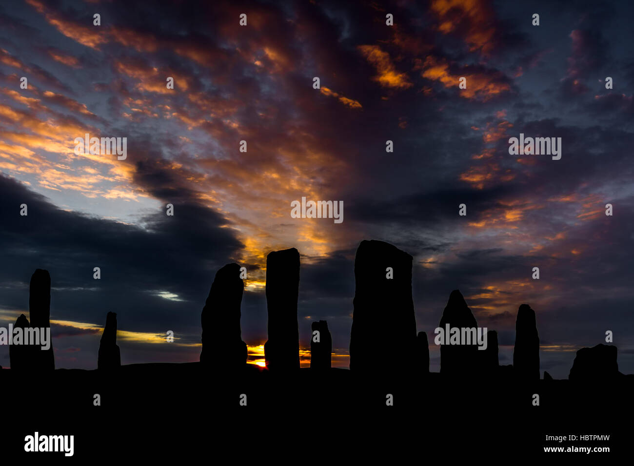 Callanish Standing Stones al atardecer en la isla de Lewis Foto de stock