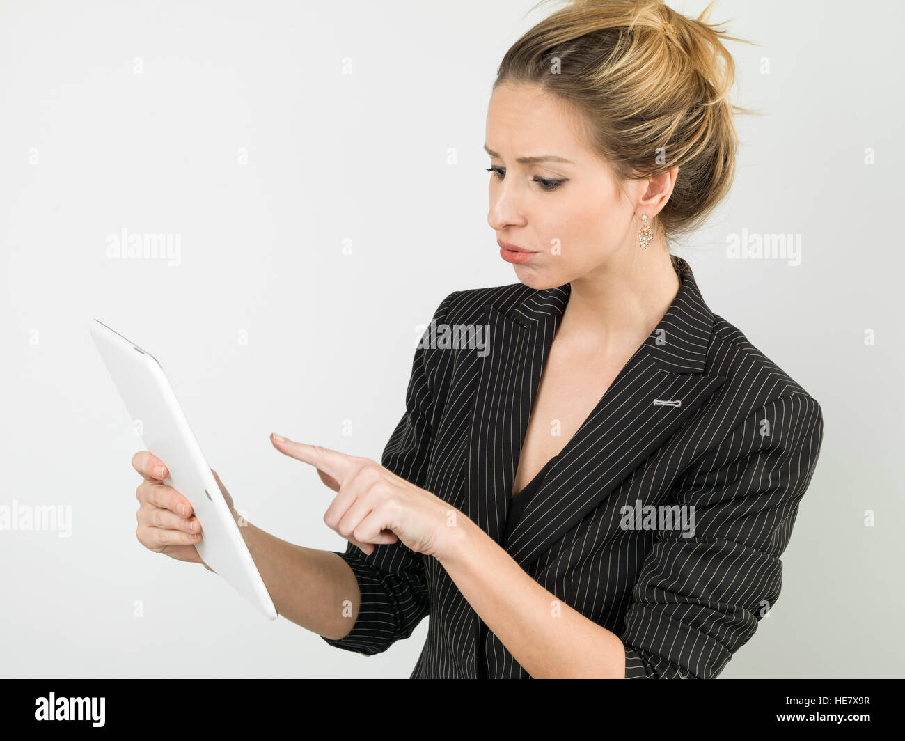Hermosa rubia empresarias con tablet pc Foto de stock