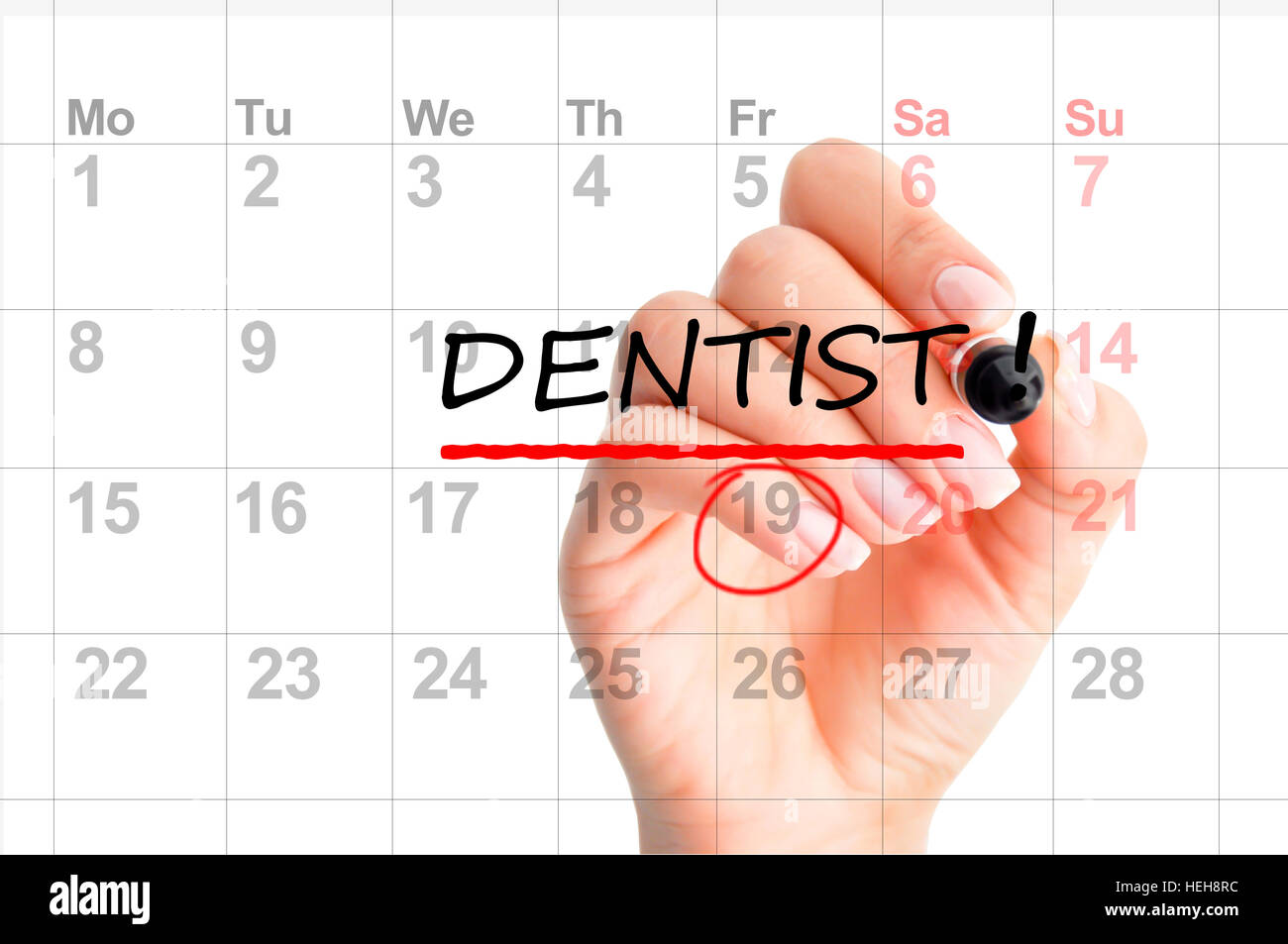 Dentista cita recordatorio sobre el planificador de calendario Foto de stock