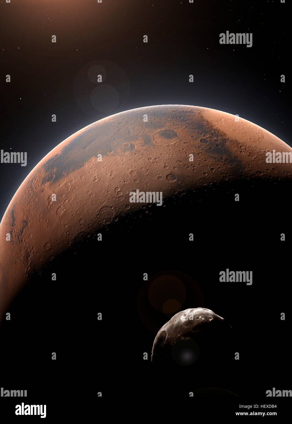 Una impresión del Planeta Rojo, Marte, el segundo planeta más pequeño del Sistema Solar (después de Mercurio). Su recóndita luna Fobos, es visto en el primer plano. Foto de stock