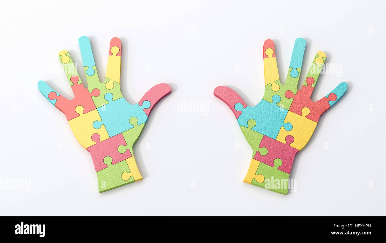 Dos manos puzzle multicolor Foto de stock