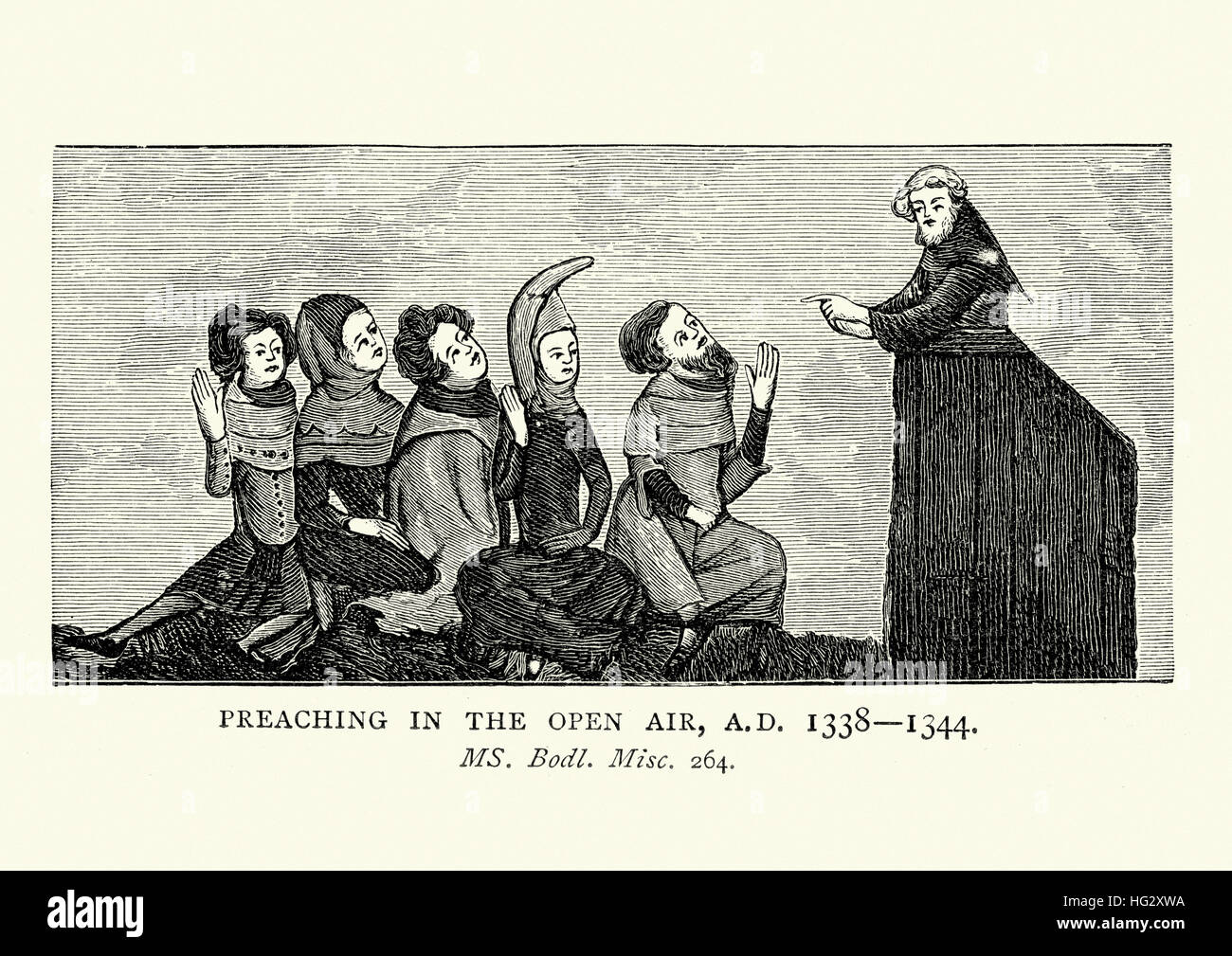 Predicador medieval predicando al aire libre, del siglo XIV. Foto de stock