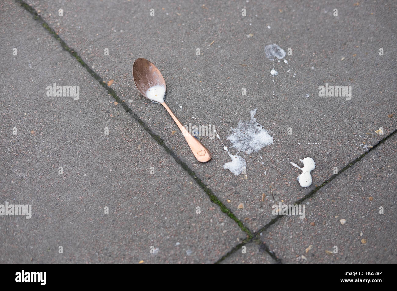 'Shattered Dreams' - niño deja caer sus helados Foto de stock