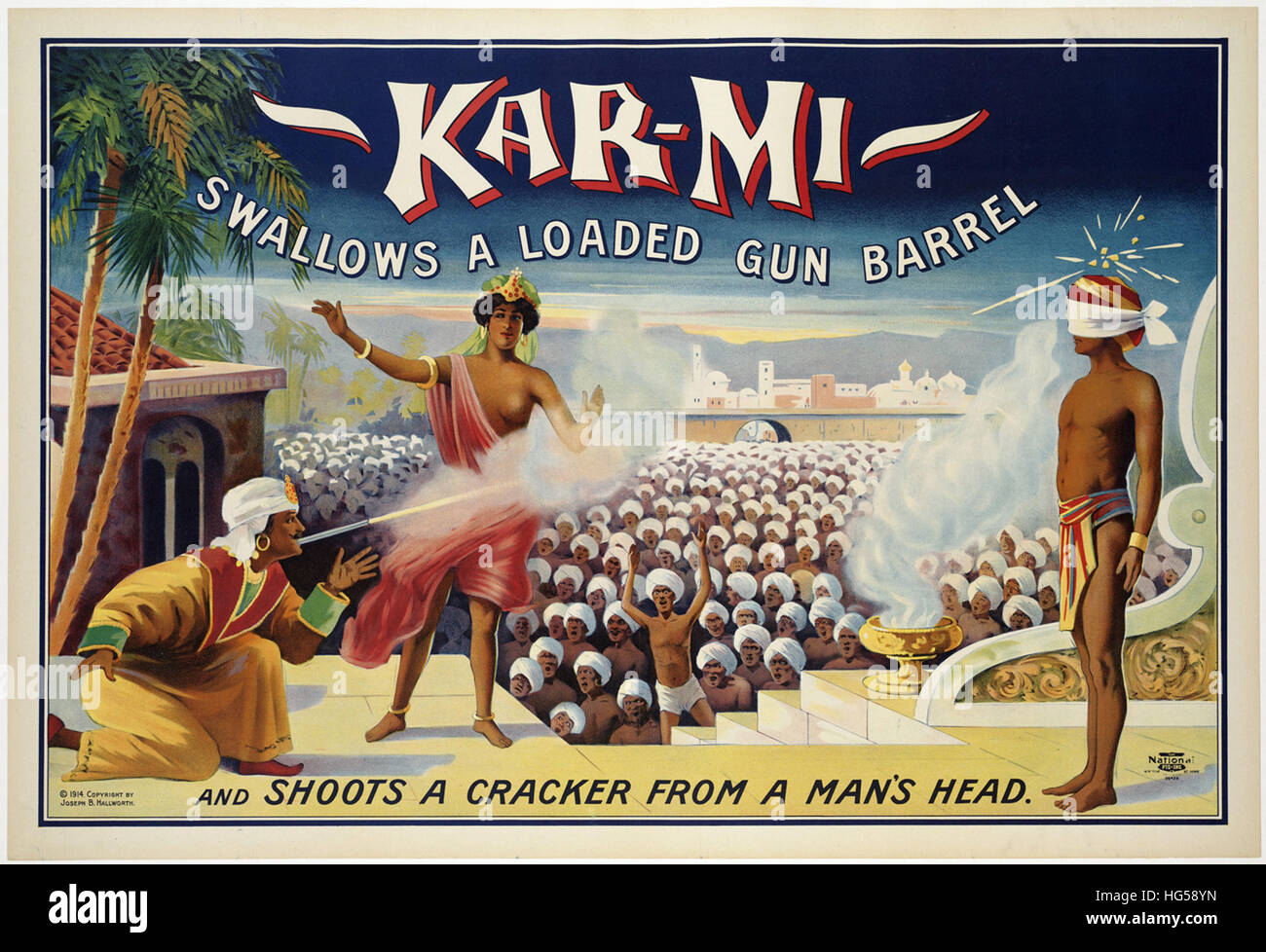 Circus Poster - Kar-mi traga una pistola cargada barril   y dispara un cracker desde la cabeza de un hombre. Foto de stock