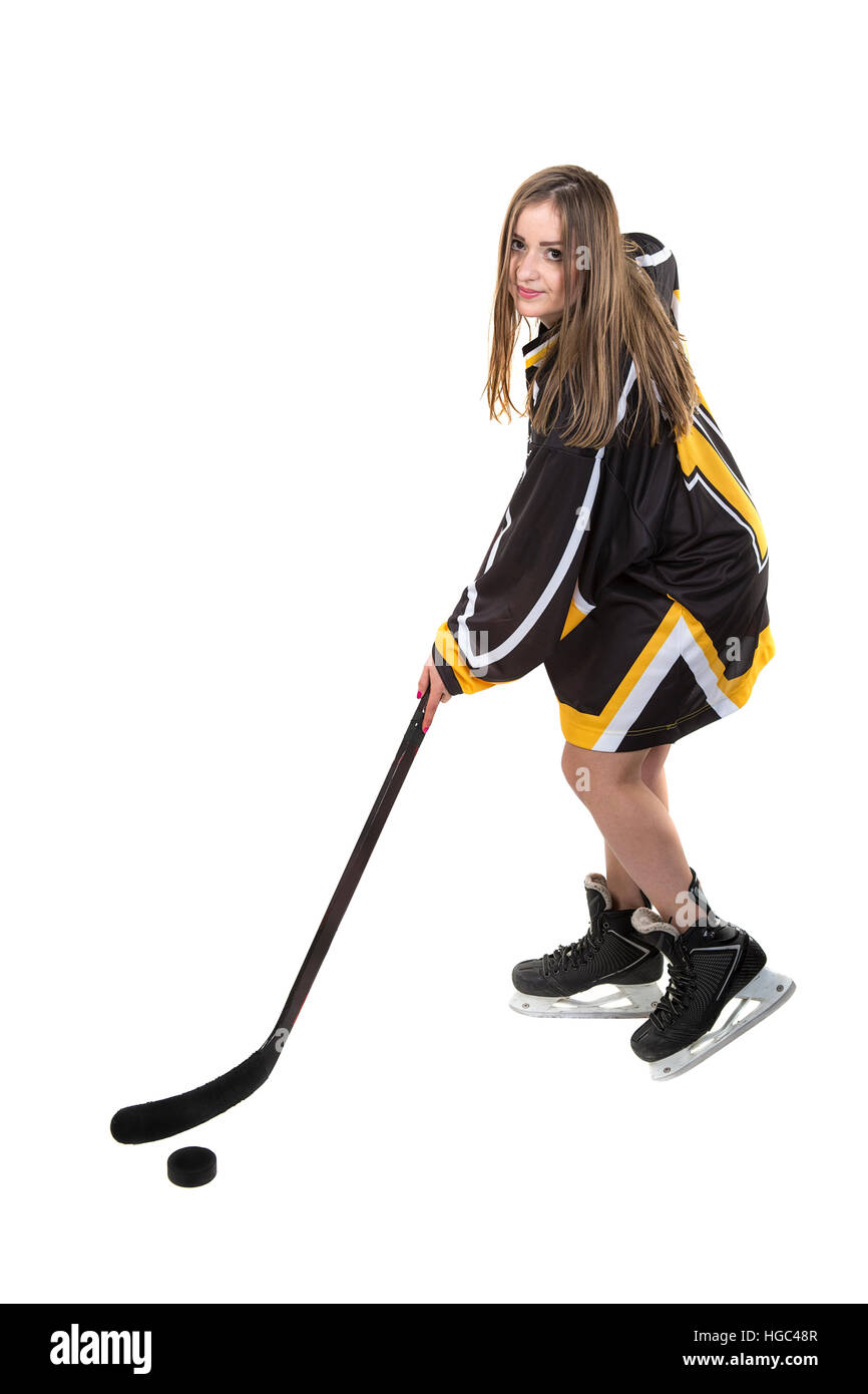Chica jugando al hockey. Foto de stock