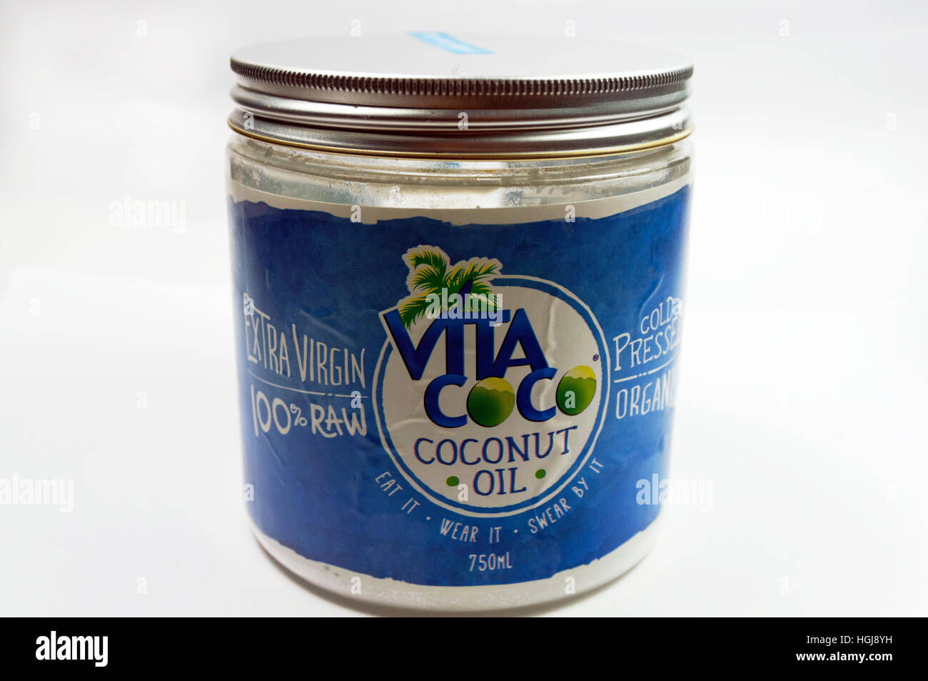 Materias Virgin Coconut Oil jar. Foto de stock