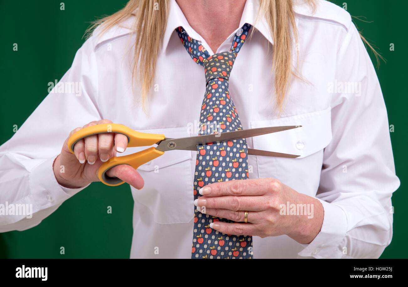 Woman cutting a tie fotografías e imágenes de alta resolución - Alamy