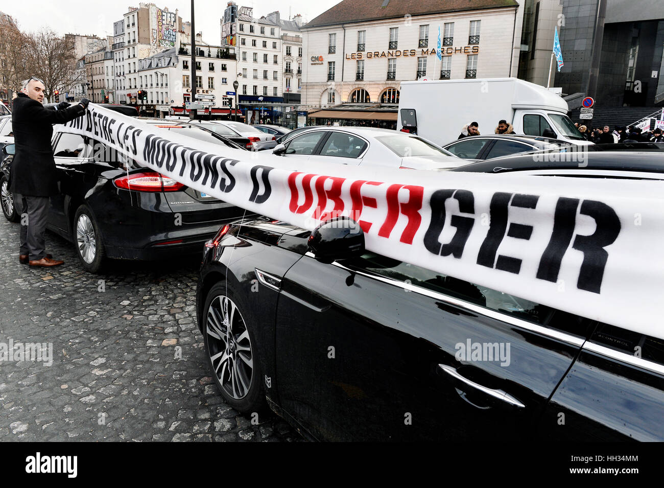 VTC Controladores Uber protesta en París, 16 de enero de 2017, la Place de la Bastille, París Foto de stock