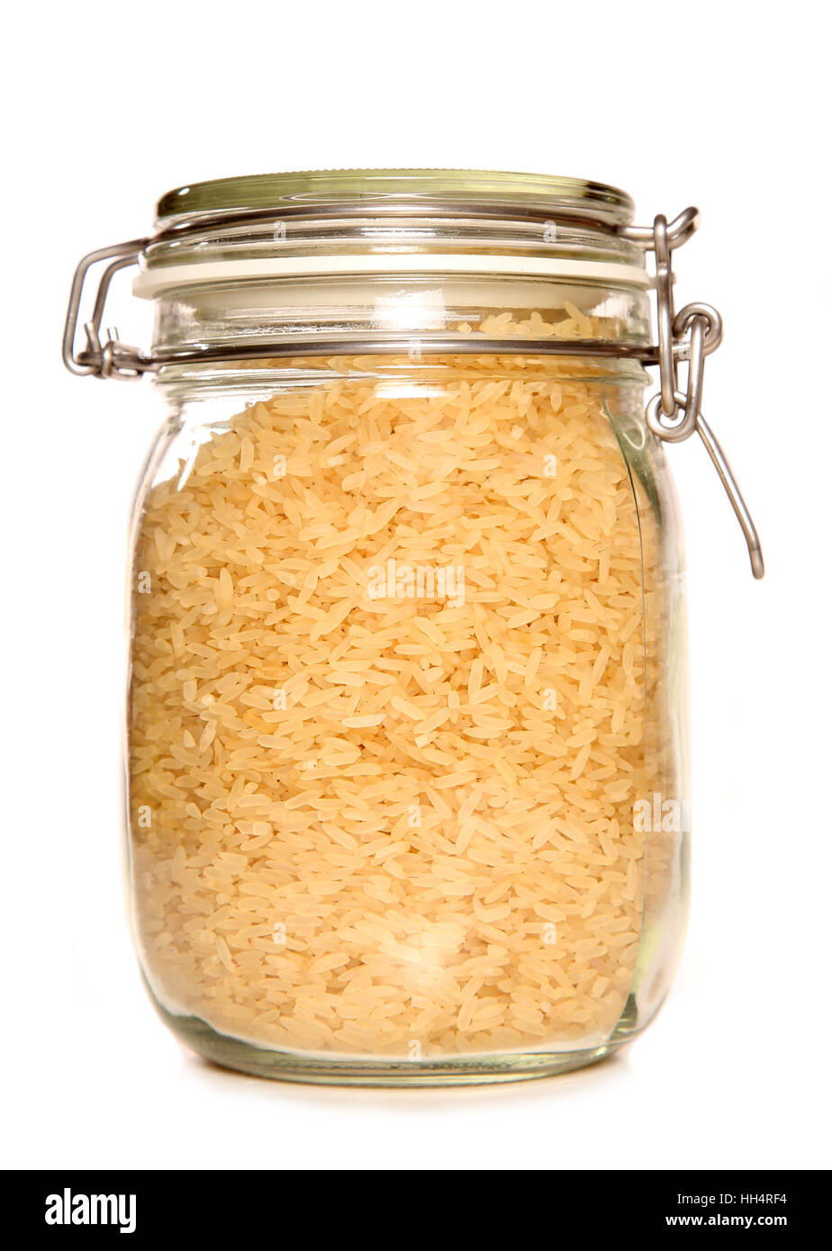Integrales arroz en una jarra studio recorte Foto de stock