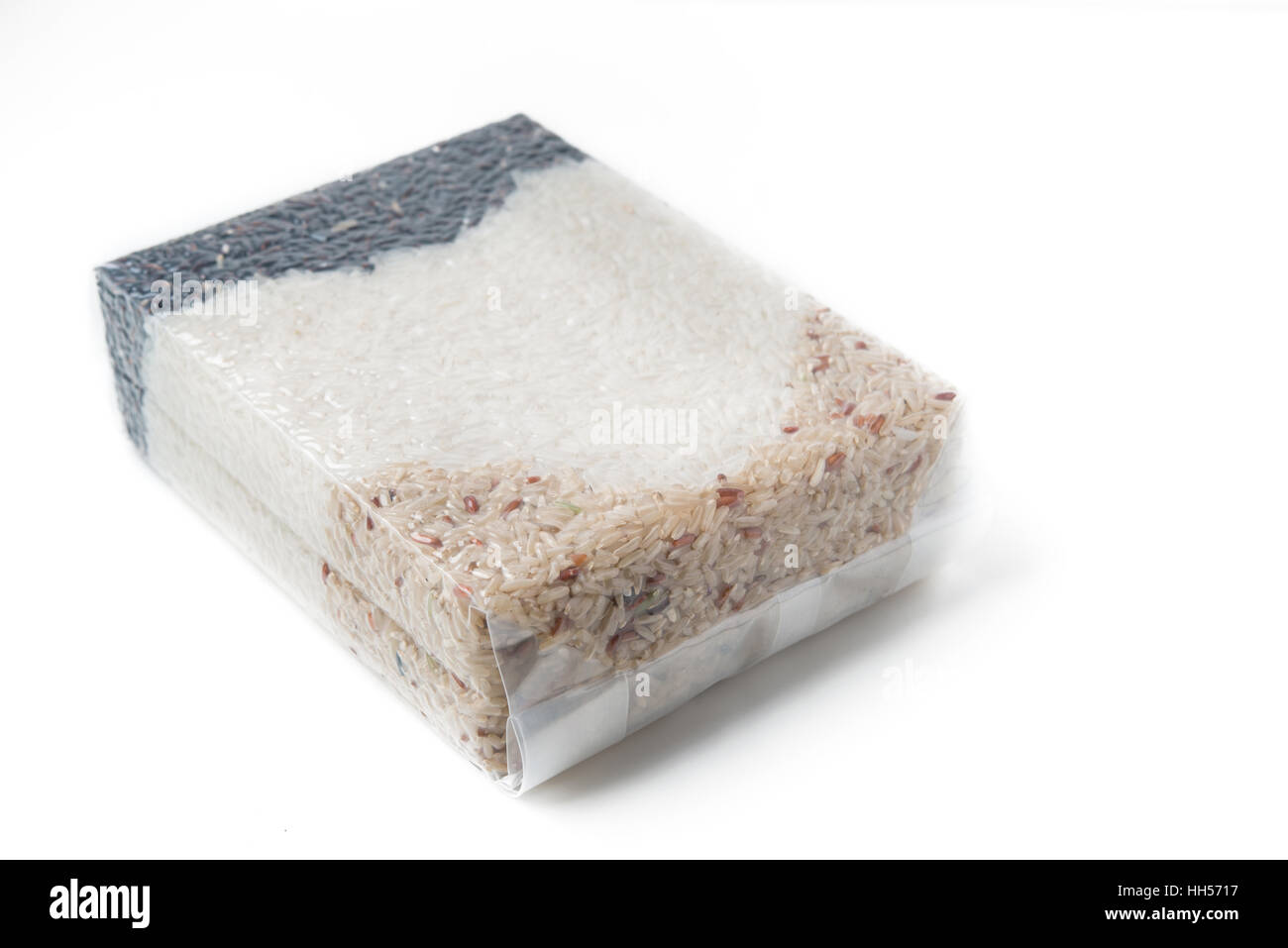 Arroz Jazmín y arroz integral y arroz bayas en bolsa de vacío Foto de stock