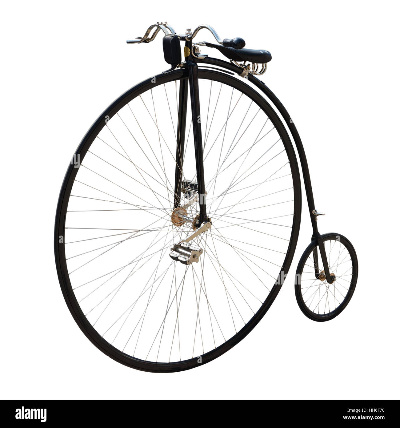 Penny-farthing o rueda alta o normal. Bicicleta con una rueda delantera grande aislado en blanco. Foto de stock