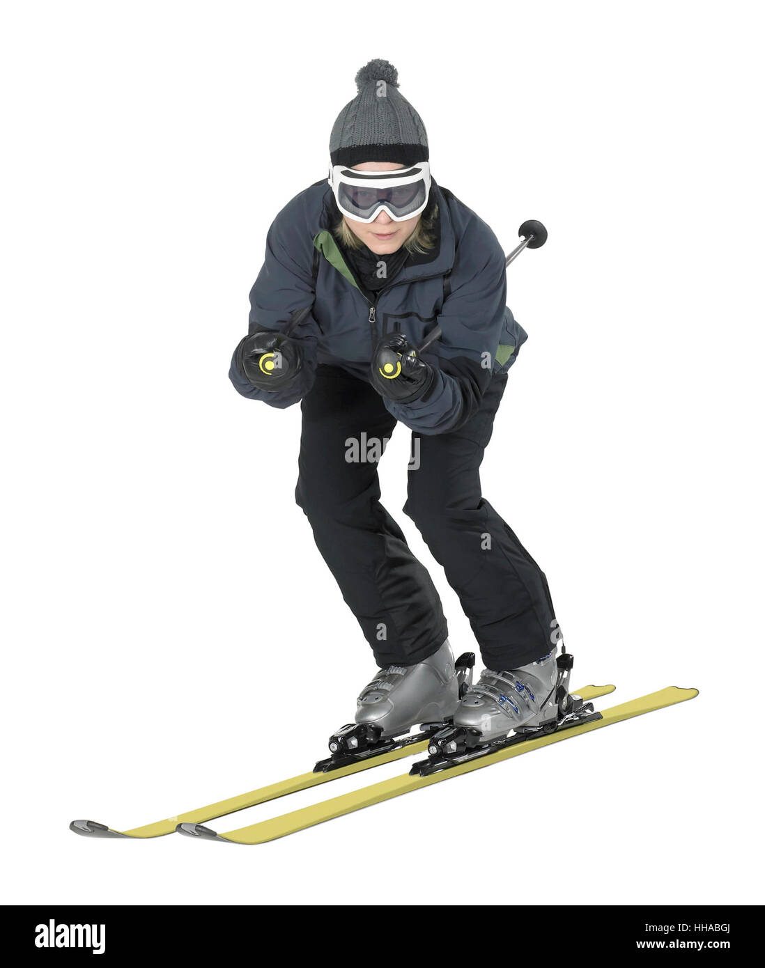 Captura de cuerpo entero de un oscuro vestidos niña de esquí aislado en blanco Foto de stock